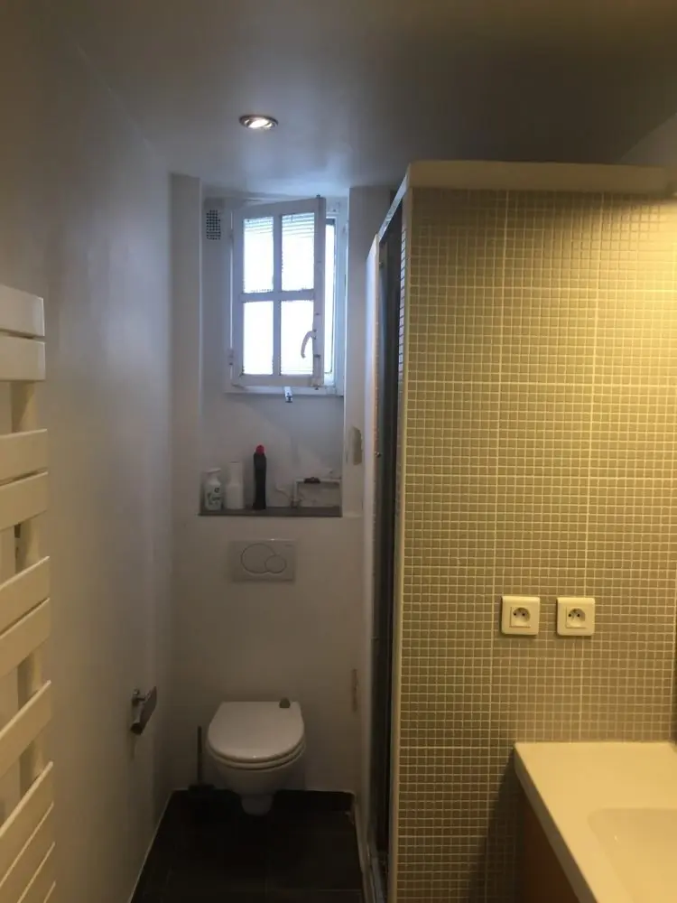 Antes de reforma de baño con bañera antigua